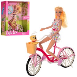 Кукла DEFA на велосипеде